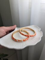 دستبند زنانه میناکاری نارنجی طرح گل